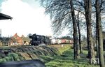 50 0052 (ex 50 1571, ex 50 3676, urspr. Henschel, Baujahr 1941) vom Bw Wittenberge mit einem Güterzug in Grabow zwischen Ludwigslust und Wittenberge. (20.04.1973) <i>Foto: Robin Fell</i>