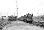 23 1057 vom Bw Nossen fährt mit einem Gex in Radebeul Ost ein. Vor dem Lokschuppen stehen die Loks der Lößnitzgrundbahn. (08.07.1968) <i>Foto: Will A. Reed</i>