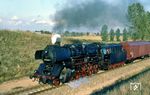 Die ölgefeuerte 50 0059 vom Bw Angermünde (ex 50 2307, ex 50 3533) mit einem Güterzug bei Casekow in der Uckermark. (02.09.1978) <i>Foto: Colin Brack</i>