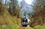 Und wieder der Sandzug Gag 56355, diesmal mit 50 3523 am Rochsburger Tunnel. (19.04.1987) <i>Foto: Volker Fröhmer</i>