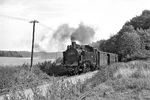 99 1784 erreicht mit einem Personenzug nach Putbus den Haltepunkt Garftitz auf der Strecke Göhren - Putbus auf Rügen. (05.09.1983) <i>Foto: Joachim Schmidt</i>