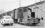 DR 100 094 (ex Köf 0194 von Gmeinder, Baujahr 1935) mit einer "Rennpappe" (Trabant) in Zittau. Die Kleinlok war dort bis 1974 im Einsatz. (06.06.1971) <i>Foto: Michael Malke</i>
