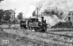 99 1590 in Rothenkirchen (Vogtl) auf der mit rund 42 km ersten, steilsten und längsten Schmalspurbahn Sachsens von Wilkau-Haßlau über Kirchberg - Stützengrün - Schönheide nach Carlsfeld. Zwischen 1965 und 1977 wurde der Verkehr auf der Schmalspurbahn schrittweise beendet. Auf dem letzten Reststück zwischen Rothenkirchen und Schönheide Süd wurde der Reiseverkehr am 27. September 1975 eingestellt, der letzte Güterzug zur Bürstenfabrik Stützengrün verkehrte am 30. April 1977. (02.10.1974) <i>Foto: Joachim Schmidt</i>