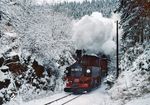 99 1561 mit einem Güterzug nach Jöhstadt an der Brücke hinter Niederschmiedeberg. (01.01.1978) <i>Foto: Joachim Schmidt</i>