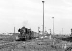 Zum letzten Mal trifft 03 2155 vom Bw Lutherstadt Wittenberg mit P 3516 aus Halle (Saale) am Fernbahnsteig in Berlin-Schöneweide ein. In Bildmitte das markante Stellwerk "Sw" an der Bw-Einfahrt, rechts die Aufstellgleise für Reisezüge.  (26.05.1979) <i>Foto: Karsten Risch</i>