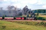 99 7246, die mit P 14147 hinter Stiege einmal den Fotografen umrundet. (29.07.1988) <i>Foto: Wolfgang Bügel</i>