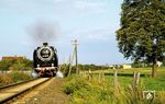 01 2137 mit einem Sonderzug zwischen Frose und Ballenstedt auf der Fahrt nach Gernrode. Es war eine Sonderfahrt mit den letzten Dampflokomotiven der Rbd Magdeburg. Die Strecke ist inzwischen abgebaut. (05.1979) <i>Foto: Karsten Risch</i>