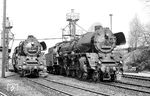 Im Bw Lutherstadt Wittenberg warten die dort beheimateten 03 2083 und 03 2148. Mit Ende der Dampfzeit in Wittenberg Ende 1978 wurden beide Loks abgestellt. Im Jahr 1994 wurde das Bw in einen Betriebshof umgewandelt, ab 1998 war es eine Einsatzstelle von DB Regio. Das Bw schloss seine Pforten im Jahr 2000, nach 160 Jahren. Heute wird das Gelände vom „Förderverein Berlin - Anhaltische Eisenbahn e.V.“ genutzt.  (28.04.1977) <i>Foto: Hans-Jürgen Trunk</i>