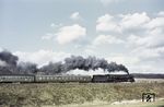 01 534 mit D 199 bei Weiterode auf dem Weg in den Osten. (27.03.1970) <i>Foto: Robin Fell</i>