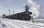 Die Bespannung der "Interzonenzüge" D 163/164 zwischen Hamburg und Berlin war im Fahrplanjahr 1967/68 Aufgabe der Wittenberger 03. Hier fährt 03 135 mit dem D 163 nach Berlin aus dem damaligen Grenzbahnhof Büchen. (18.02.1968) <i>Foto: Robin Fell</i>