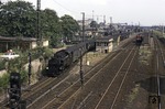 99 1783 verlässt den Bahnhof Radebeul-Ost auf dem 750 mm Schmalspurgleis Richtung Radeburg. Auf der Normalspurstrecke wartet eine DR-V 100 (Baureihe 110).  (27.07.1977) <i>Foto: Will A. Reed</i>