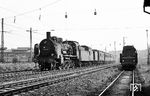 38 3163 (Bw Falkenberg/Elster), ausgerüstet mit einem P 10-Tender, vor einem reinrassigen Personenzug aus Länderbahnwagen in Halle (Saale). Rechts steht 23 1095 vom Bw Halle (Saale) P. (1967) <i>Foto: Robin Fell</i>