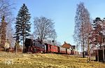 Nach dem Halt in Elend rollt 99 7244 mit P 14445 in der Bahnhofsausfahrt ins Gefälle zur Kalten Bode hinab. (24.02.1990) <i>Foto: Wolfgang Bügel</i>