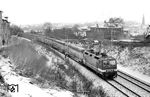 243 118 vom Bw Erfurt vor dem aus DB-Wagen gebildeten D 452 (Frankfurt/Oder - Leipzig - Erfurt - Gerstungen - Bebra - Kassel - Altenbeken - Hamm - Essen - Krefeld - Mönchengladbach) in Apolda. (29.01.1987) <i>Foto: Thomas Fischer</i>